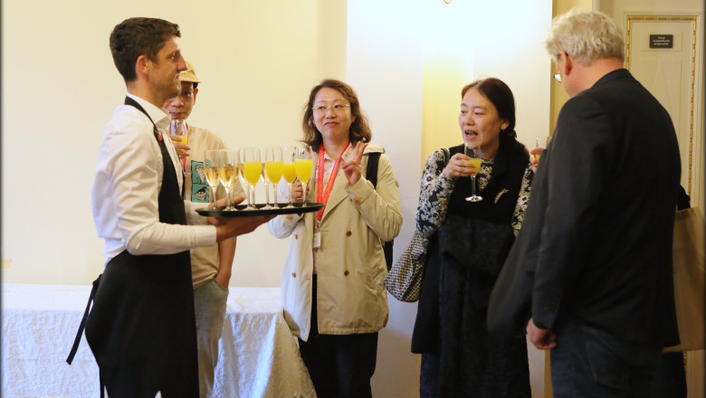 Left to right: catering staff, Yang Xiaobo, Wu Hui-ling, x and Eric S. Nelson